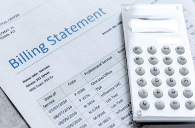 Image of a billing statement paper with a calculator